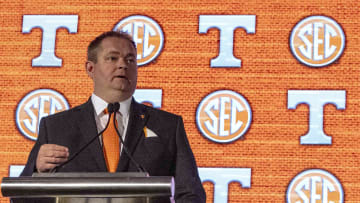 Jul 20, 2021; Hoover, Alabama, USA; Tennessee Volunteers head coach Josh Heupel (left) talks with the media during SEC Media Days at Hyatt Regency Birmingham. Mandatory Credit: Vasha Hunt-USA TODAY Sports