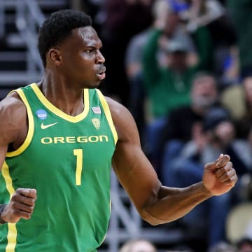Mar 21, 2024; Pittsburgh, PA, USA; Oregon Ducks center N'Faly Dante (1) celebrates after a play during the second half of the game against the South Carolina Gamecocks in the first round of the 2024 NCAA Tournament at PPG Paints Arena. Mandatory Credit: Charles LeClaire-USA TODAY Sports