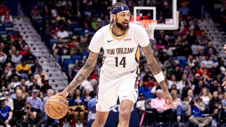 Feb 25, 2024; New Orleans, Louisiana, USA; New Orleans Pelicans forward Brandon Ingram (14) dribbles against the Chicago Bulls during the first half at Smoothie King Center.