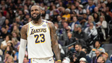 Dec 21, 2024; Sacramento, California, USA; Los Angeles Lakers forward LeBron James (23) smiles after his team scored against the Sacramento Kings during the fourth quarter at Golden 1 Center. Mandatory Credit: Ed Szczepanski-Imagn Images
