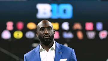 UCLA Bruins head coach DeShaun Foster walks to the media podium during the Big 10 football media day at Lucas Oil Stadium. Mandatory Credit: Robert Goddin-USA TODAY Sports