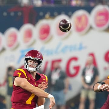 Sep 1, 2024; Paradise, Nevada, USA; Southern California Trojans quarterback Miller Moss (7) throws a pass against the LSU Tigers during the fourth quarter at Allegiant Stadium.