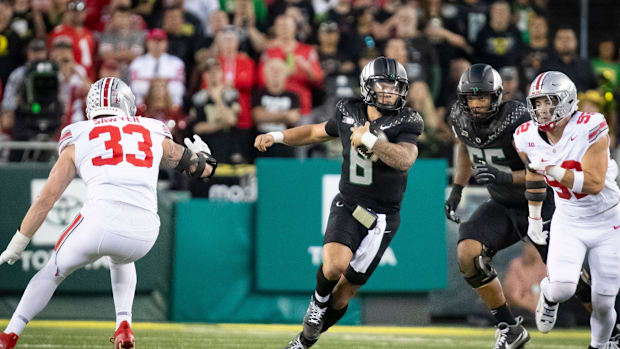 Oregon Ducks quarterback Dillon Gabriel carries the ball as the No. 3 Oregon Ducks host the No. 2 Ohio State Buckeyes Saturda