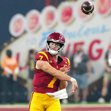 Sep 1, 2024; Paradise, Nevada, USA; Southern California Trojans quarterback Miller Moss (7) throws a pass against the LSU Tigers during the fourth quarter at Allegiant Stadium. Mandatory Credit: Stephen R. Sylvanie-Imagn Images