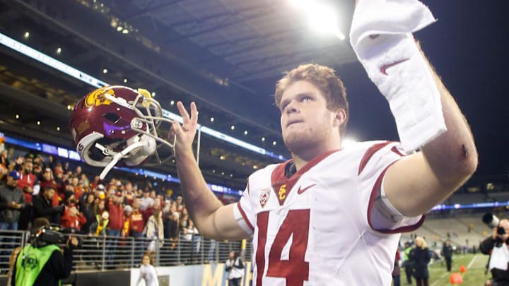 Nov 12, 2016; Seattle, WA, USA; USC Trojans quarterback Sam Darnold (14) walks back to the locker room following a 26-13 victory against the Washington Huskies at Husky Stadium. Mandatory Credit: Joe Nicholson-Imagn Images