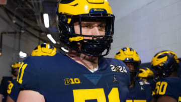 Jan 8, 2024; Houston, TX, USA; Michigan Wolverines offensive lineman Evan Link (71) against the Washington Huskies during the 2024 College Football Playoff national championship game at NRG Stadium. Mandatory Credit: Mark J. Rebilas-USA TODAY Sports