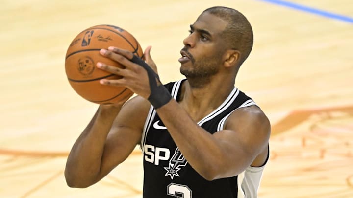 San Antonio Spurs guard Chris Paul shoots a basket. San Antonio Spurs guard Chris Paul shoots a basket.
