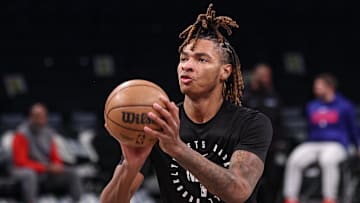 Jan 4, 2025; Brooklyn, New York, USA; Brooklyn Nets forward Noah Clowney (21) warms up before the game against the Philadelphia 76ers at Barclays Center. Mandatory Credit: Vincent Carchietta-Imagn Images