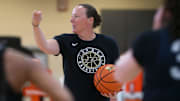 Purdue Boilermakers head coach Katie Gearlds gives drill instructions 