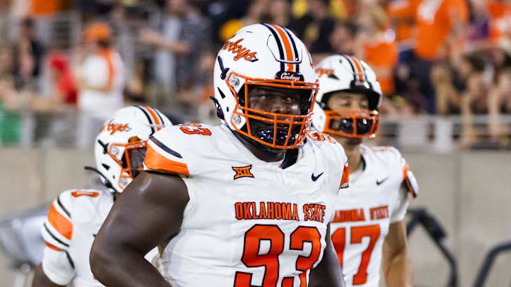 Sep 9, 2023; Tempe, Arizona, USA; Oklahoma State Cowboys nose tackle Collin Clay (93) against the Arizona State Sun Devils at Mountain America Stadium. Mandatory Credit: Mark J. Rebilas-Imagn Images