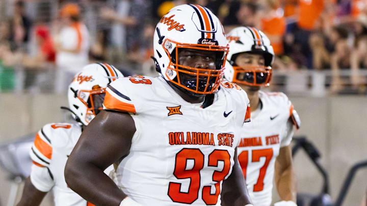 Oklahoma State Cowboys nose tackle Collin Clay (93) against the Arizona State Sun Devils at Mountain America Stadium. Clay will face Arkansas, the program he signed with coming out of high school.