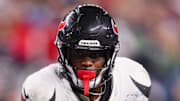 Houston Texans running back Woody Marks (27) runs the ball during the fourth quarter against the Seattle Seahawks at Lumen Field. 