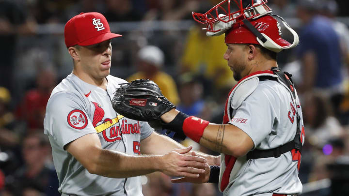 Jul 2, 2024; Pittsburgh, Pennsylvania, USA;  St. Louis Cardinals relief pitcher Ryan Helsley (56) and catcher Willson Contreras (40) celebrate after defeating the Pittsburgh Pirates at PNC Park. St. Louis won 7-4. Mandatory Credit: Charles LeClaire-USA TODAY Sports