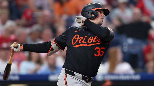 Baltimore Orioles catcher Adley Rutschman (35) hits a single against the Philadelphia Phillies during the fourth inning