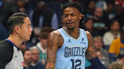 Nov 7, 2025; Memphis, Tennessee, USA; Memphis Grizzlies guard Ja Morant (12) reacts toward an official during the first quarter against the Dallas Mavericks at FedExForum. Mandatory Credit: Petre Thomas-Imagn Images