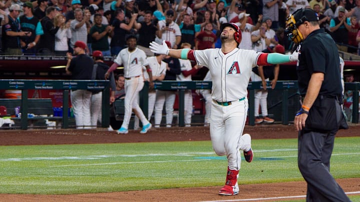 Arizona Diamondbacks infielder Eugenio Suarez reacts after hitting his fourth home run of the game against the Atlanta Braves during the ninth inning at Chase Field. Arizona Diamondbacks infielder Eugenio Suarez reacts after hitting his fourth home run of the game against the Atlanta Braves during the ninth inning at Chase Field.