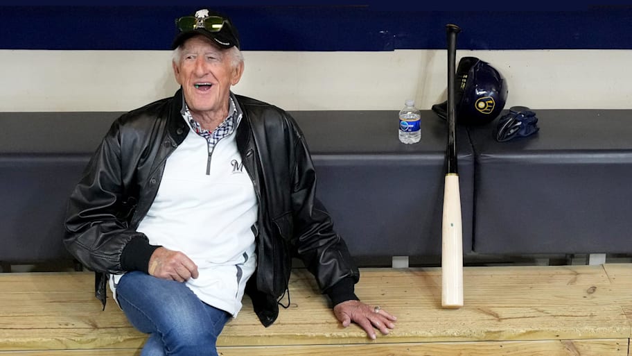 Bob Uecker sits in the Brewers dugout at American Family Field in Milwaukee.