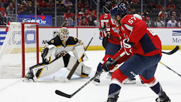 Oct 5, 2024; Washington, District of Columbia, USA; Washington Capitals defenseman Trevor van Riemsdyk (57) scores a goal on Boston Bruins goaltender Brandon Bussi (30) in the third period at Capital One Arena. Mandatory Credit: Geoff Burke-Imagn Images