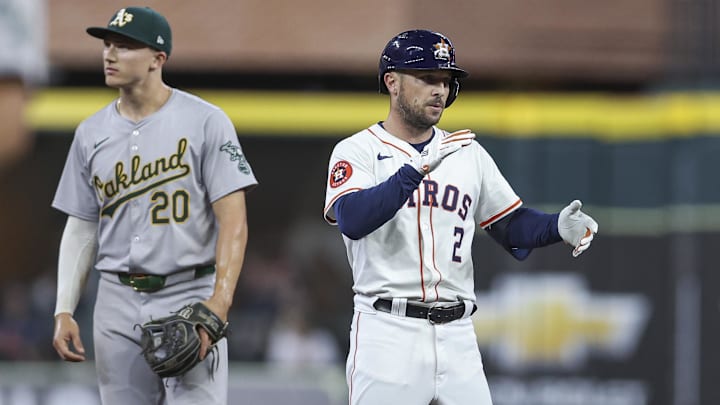 Sep 11, 2024; Houston, Texas, USA; Houston Astros third baseman Alex Bregman (2) reacts after hitting a double during the second inning against the Oakland Athletics at Minute Maid Park.