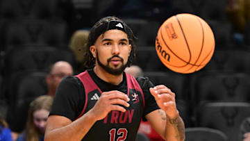 Mar 20, 2025; Milwaukee, WI, USA;  Troy Trojans guard Tayton Conerway (12) works out during NCAA Tournament First Round Practice at Fiserv Forum. Mandatory Credit: Benny Sieu-Imagn Images
