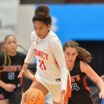 Cardinal Mooney forward Kali Barrett (#21) starts a fast break as the King's Academy defenders try and catch up. Cardinal Mooney defeated King's Academy Wednesday, Feb. 23, 2022 in the Class 3A bracket in the girls state basketball tournament in Lakeland.

Sar Mooney Girls Basketball 001