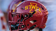 Nov 9, 2024; Kansas City, Missouri, USA; Iowa State Cyclones helmets on the bench during the first quarter against the Kansas Jayhawks at GEHA Field at Arrowhead Stadium. 