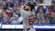 Aug 30, 2024; Detroit, Michigan, USA;  Boston Red Sox outfielder Wilyer Abreu (52) hits a sacrifice fly in the third inning against the Detroit Tigers at Comerica Park. Mandatory Credit: Rick Osentoski-Imagn Images