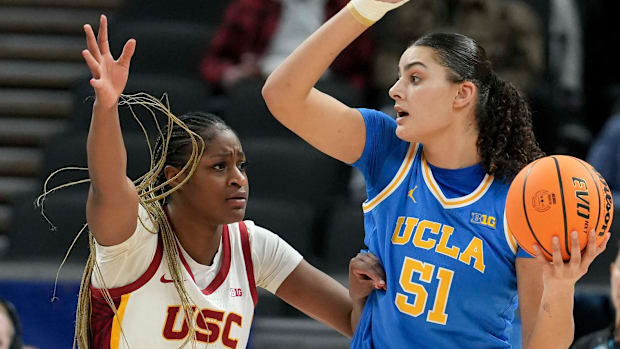 USC Trojans center Clarice Akunwafo (34) guards UCLA Bruins center Lauren Betts (51) during the second half of the 2025 TIAA 