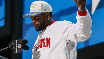 Apr 25, 2025; Green Bay, WI, USA; Former Los Angeles Chargers running back Melvin Gordon announces the team’s selection with the 86th overall pick during the third round of the 2025 NFL Draft at Lambeau Field. Mandatory Credit: Tork Mason/USA Today Network via Imagn Images