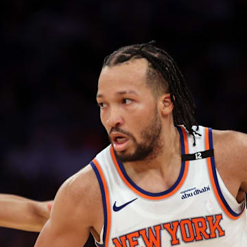 New York Knicks guard Jalen Brunson controls the ball against Indiana Pacers guard Andrew Nembhard. Mandatory Credit: Vincent Carchietta-Imagn Images