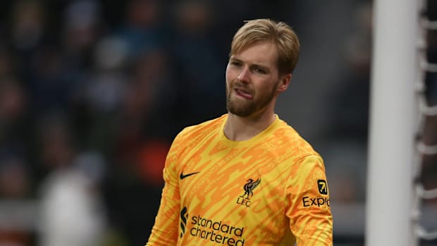Caoimhin Kelleher participates in the Premier League match between Newcastle United and Liverpool at St. James' Park