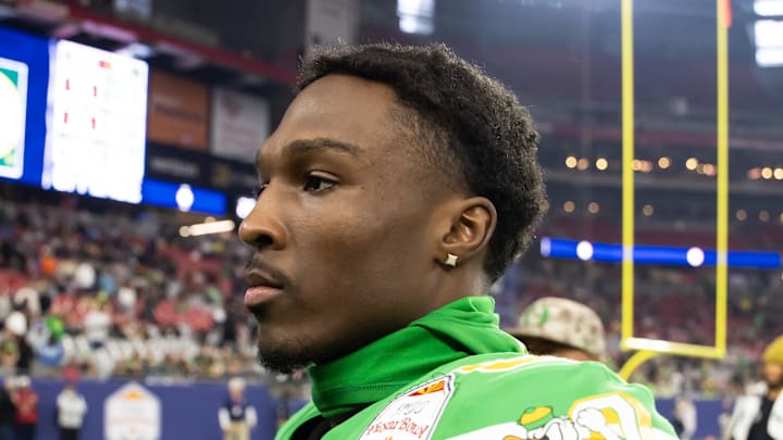 Oregon Ducks wide receiver Jurrion Dickey (99) against the Liberty Flames during the 2024 Fiesta Bowl at State Farm Stadium. 
