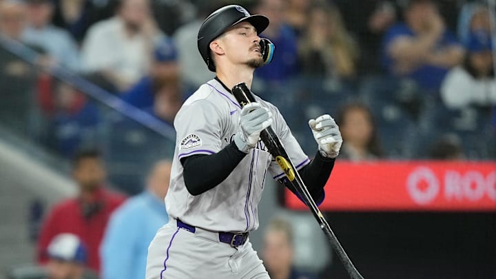 Apr 14, 2024; Toronto, Ontario, CAN; Colorado Rockies center fielder Brenton Doyle (9) reacts after striking out against the Toronto Blue Jays during the sixth inning at Rogers Centre. Apr 14, 2024; Toronto, Ontario, CAN; Colorado Rockies center fielder Brenton Doyle (9) reacts after striking out against the Toronto Blue Jays during the sixth inning at Rogers Centre.