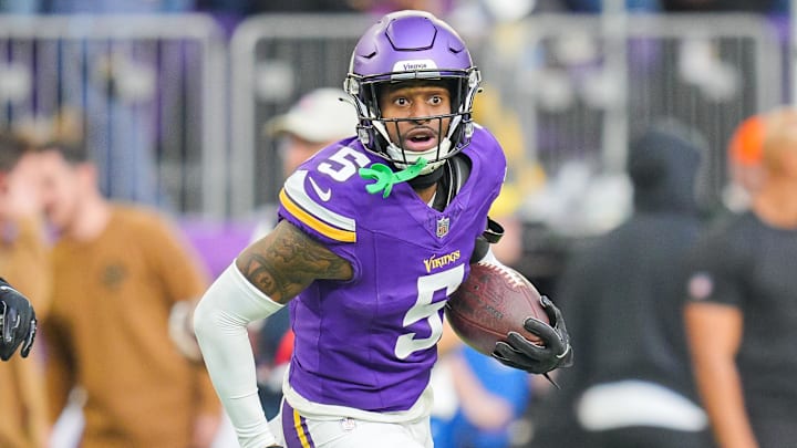 Nov 12, 2023; Minneapolis, Minnesota, USA; Minnesota Vikings cornerback Mekhi Blackmon (5) intercepts the ball against the New Orleans Saints in the fourth quarter at U.S. Bank Stadium.