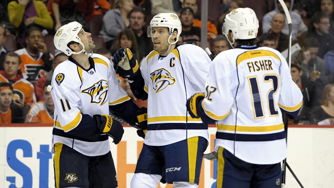 Jan 16, 2014; Philadelphia, PA, USA; Nashville Predators defenseman Shea Weber (6) celebrates his goal with center David Legwand (11) and center Mike Fisher (12) against the Philadelphia Flyers during the third period at Wells Fargo Center. The Predators defeated the Flyers, 4-3 in a shootout. Mandatory Credit: Eric Hartline-Imagn Images
