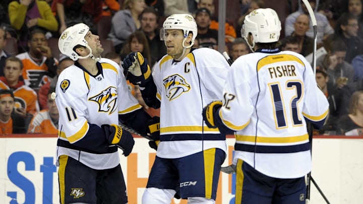 Jan 16, 2014; Philadelphia, PA, USA; Nashville Predators defenseman Shea Weber (6) celebrates his goal with center David Legwand (11) and center Mike Fisher (12) against the Philadelphia Flyers during the third period at Wells Fargo Center. The Predators defeated the Flyers, 4-3 in a shootout. Mandatory Credit: Eric Hartline-Imagn Images