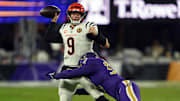 Nov 27, 2025; Baltimore, Maryland, USA; Cincinnati Bengals quarterback Joe Burrow (9) throws pass against Baltimore Ravens linebacker Kyle Van Noy (53) during the second half at M&T Bank Stadium. Mandatory Credit: Mitch Stringer-Imagn Images