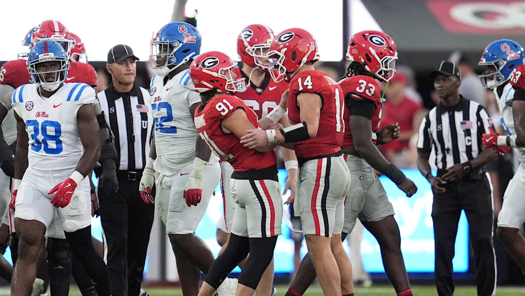 Oct 18, 2025; Athens, Georgia, USA; Georgia Bulldogs kicker Peyton Woodring (91) celebrates his field goal against the Mississippi Rebels with Georgia Bulldogs quarterback Gunner Stockton (14) during the fourth quarter of the game at Sanford Stadium. Mandatory Credit: Dale Zanine-Imagn Images Oct 18, 2025; Athens, Georgia, USA; Georgia Bulldogs kicker Peyton Woodring (91) celebrates his field goal against the Mississippi Rebels with Georgia Bulldogs quarterback Gunner Stockton (14) during the fourth quarter of the game at Sanford Stadium. Mandatory Credit: Dale Zanine-Imagn Images