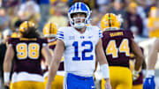 Nov 23, 2024; Tempe, Arizona, USA; Brigham Young Cougars quarterback Jake Retzlaff (12) reacts against the Arizona State Sun Devils in the second half at Mountain America Stadium. 