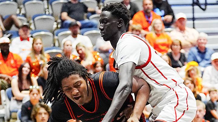 David Young of Sarasota drives around the defense of Akol Nyok of Columbus in the FHSAA Class 7A state boys basketball finals March 14, 2026. Craig Bailey/FLORIDA TODAY via USA TODAY NETWORK