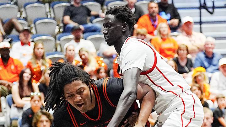 David Young of Sarasota drives around the defense of Akol Nyok of Columbus in the FHSAA Class 7A state boys basketball finals March 14, 2026. Craig Bailey/FLORIDA TODAY via USA TODAY NETWORK