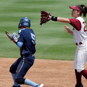 Florida State Seminoles infielder Leslie Farris (26) barely misses getting the put at second base. The Florida State Seminoles host the UNC Tar Heels for the ACC Softball Tournament finals Saturday, May 11, 2019.