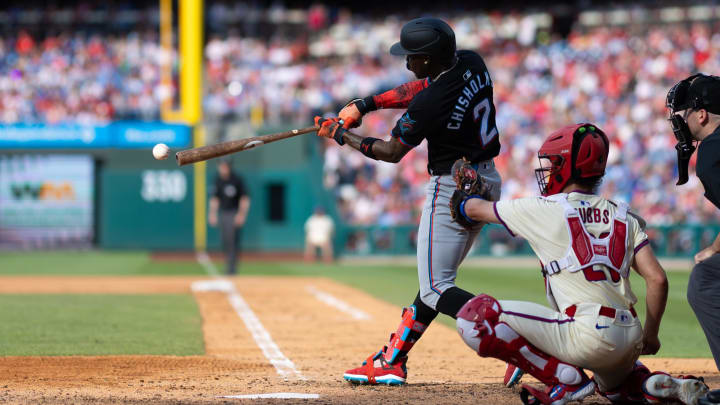 Jun 29, 2024; Philadelphia, Pennsylvania, USA; Miami Marlins outfielder Jazz Chisholm Jr. (2) hits an RBI single during the seventh inning against the Philadelphia Phillies at Citizens Bank Park. 