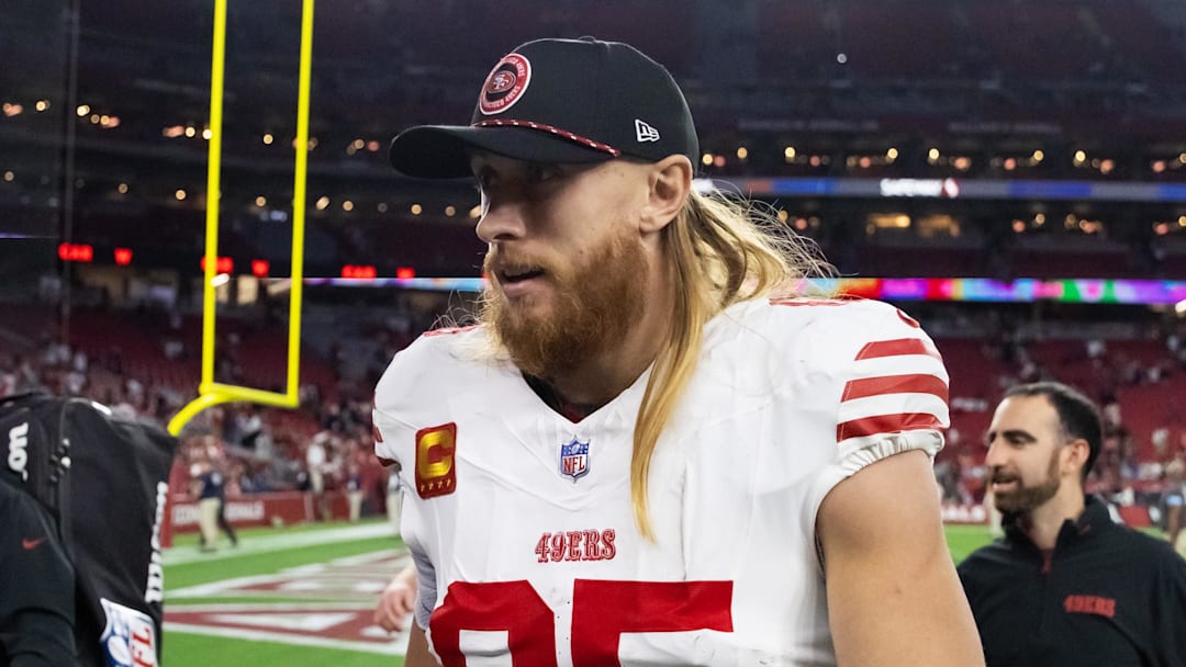 Jan 5, 2025; Glendale, Arizona, USA; San Francisco 49ers tight end George Kittle (85) against the Arizona Cardinals at State Farm Stadium. Mandatory Credit: Mark J. Rebilas-Imagn Images