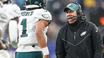 Dec 11, 2022; East Rutherford, New Jersey, USA; Philadelphia Eagles assistant coach Kevin Patullo celebrates with quarterback Jalen Hurts (1) after a touchdown during the second half against the New York Giants at MetLife Stadium.