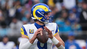 Nov 30, 2025; Charlotte, North Carolina, USA; Los Angeles Rams quarterback Matthew Stafford (9) looks to pass during the second quarter against the Carolina Panthers at Bank of America Stadium. Mandatory Credit: Scott Kinser-Imagn Images