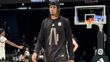 6-foot-8 Shon Abaev is a left-handed guard/forward who has been lighting up his senior season playing for Fear of God Athletics in the Overtime Elite League. The Cincinnati Bearcats and their coaching staff was present to watch him play Friday night.