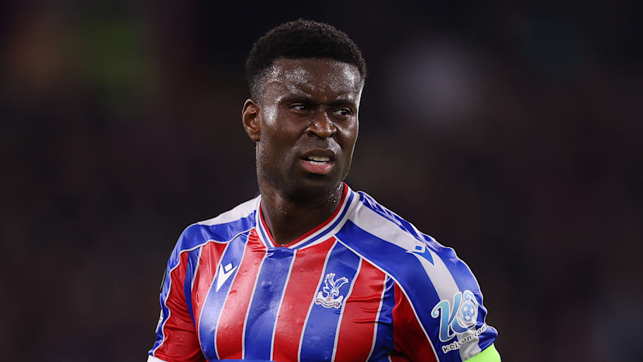 Marc Guéhi grimacing.