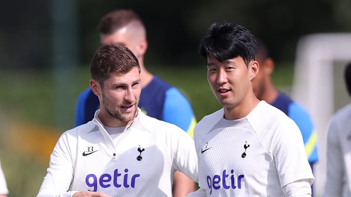 Ben Davies and Heung Mi-Son, the two most senior players from those out of contract, with the third most, Fraser Forster, in the background
