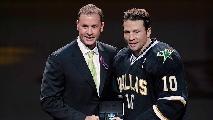 Oct 29, 2011; Dallas, TX, USA; Dallas Stars general manager Joe Nieuwendyk (left) and left wing Brenden Morrow (10) participate in pre-game ceremonies before the game against the New Jersey Devils at the American Airlines Center. The Stars defeated the Devils 3-1. Mandatory Credit: Jerome Miron-Imagn Images